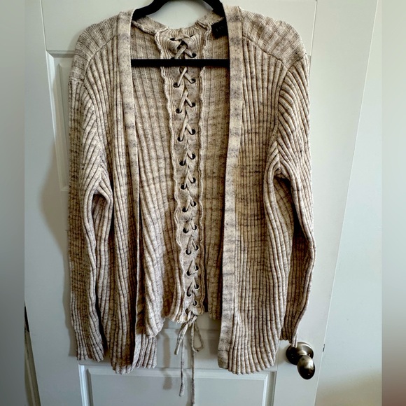 Cozy sweater with lace up detail - Picture 1 of 3